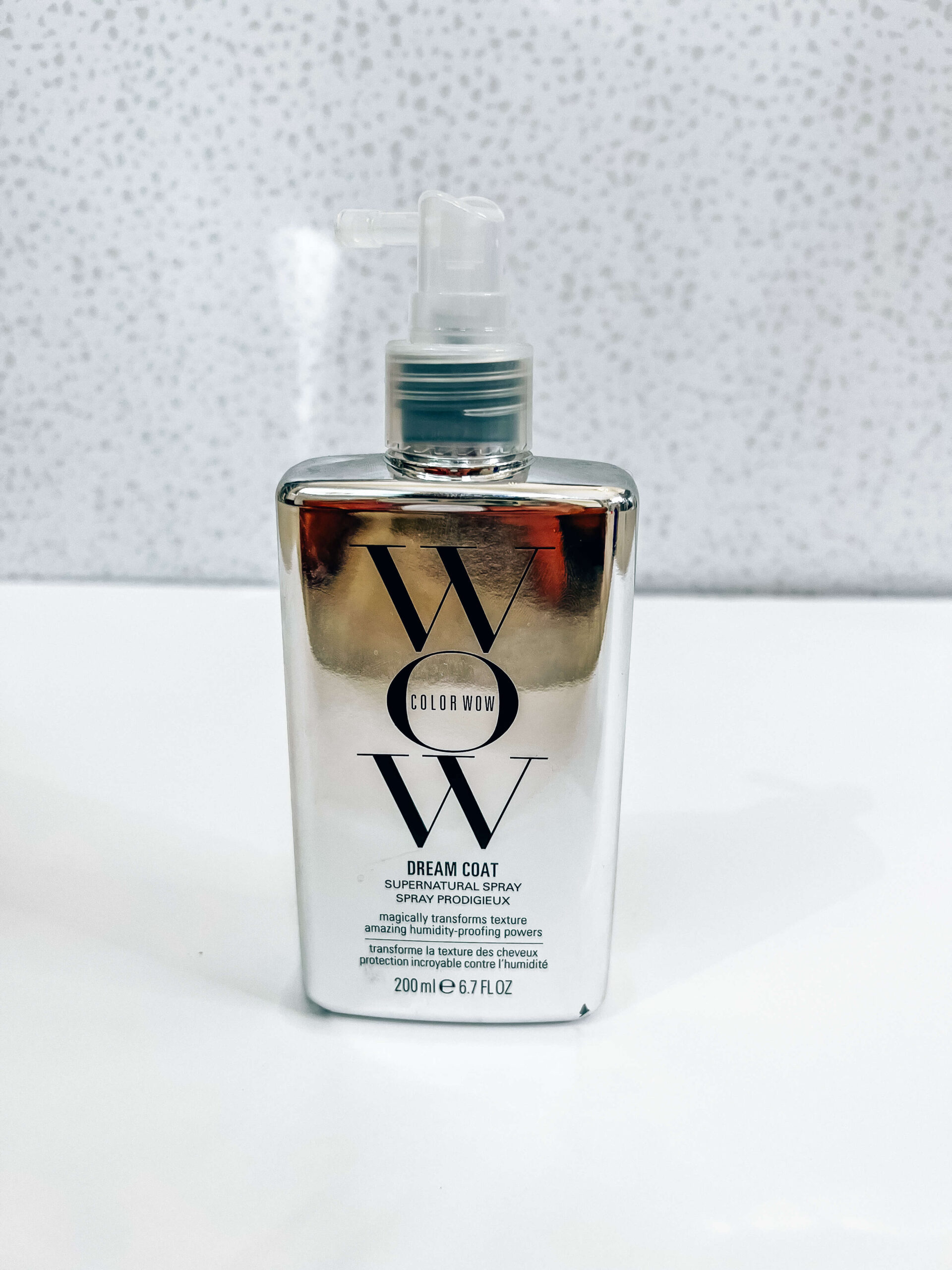 bottle of wow hair care frizz tamer