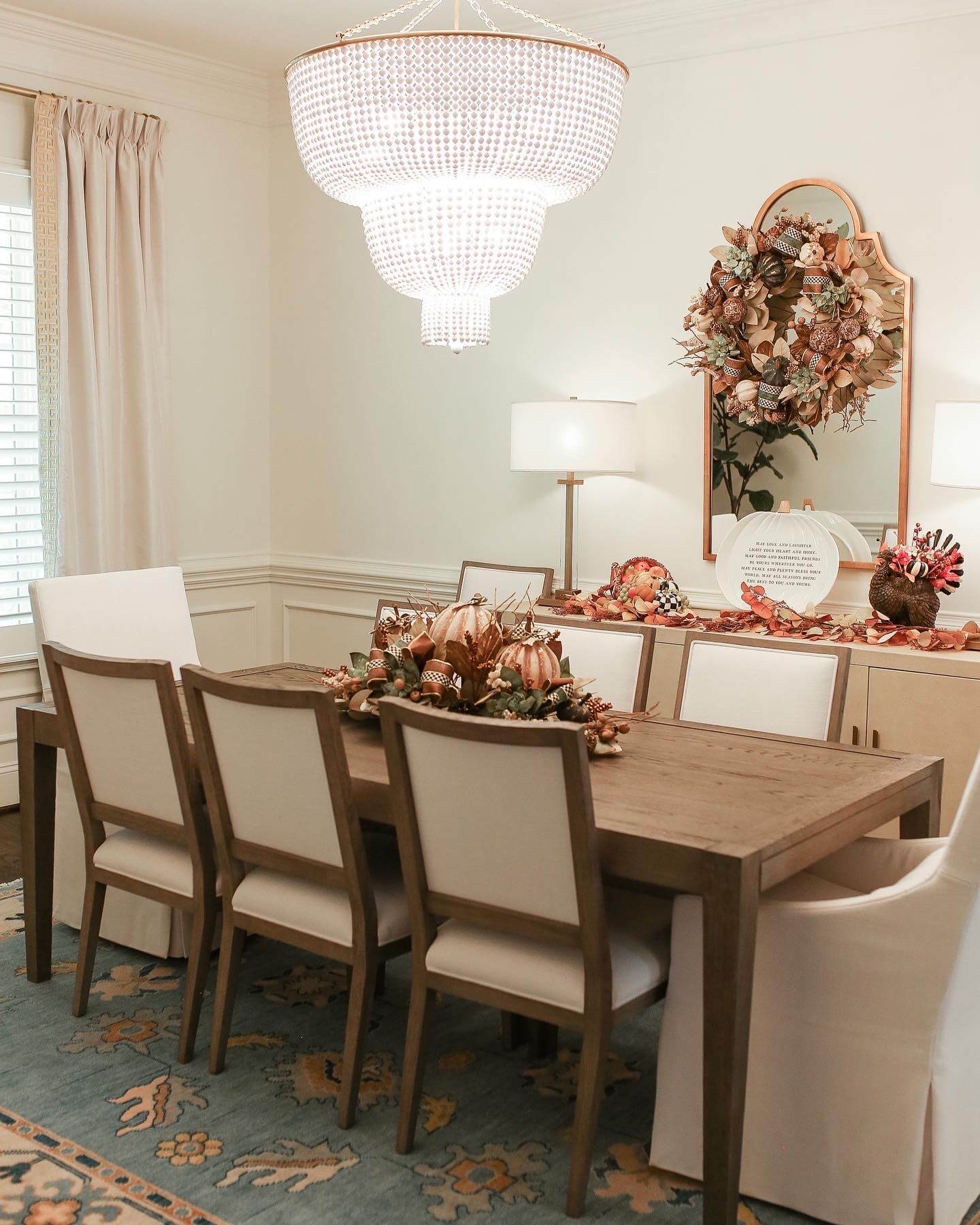 grandmillenial dining room with black and white mackenzie childs table runner