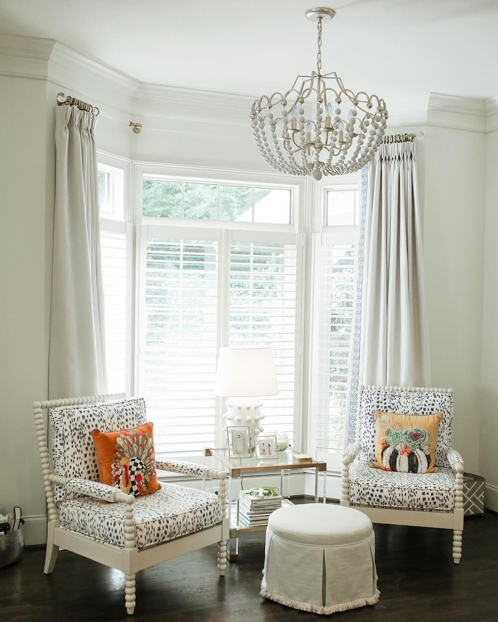 sitting area with mackenzie childs pumpkin pillows