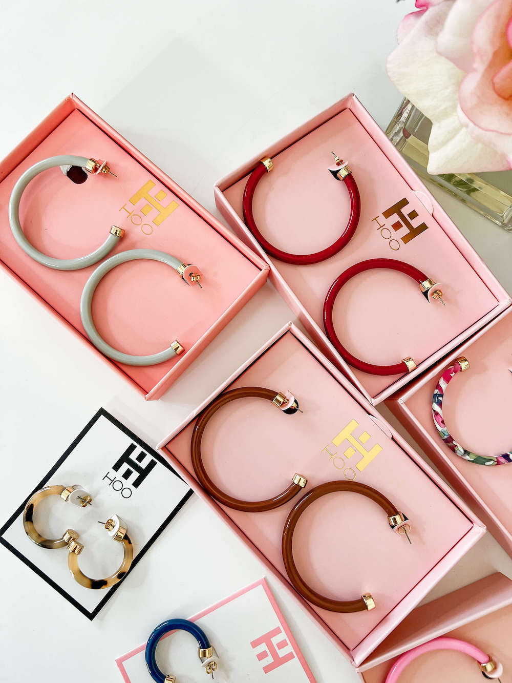 flatlay of hoo hoops earrings