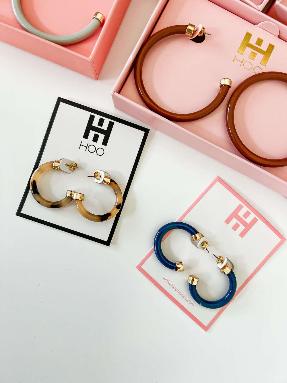 flatlay of hoo hoops earrings