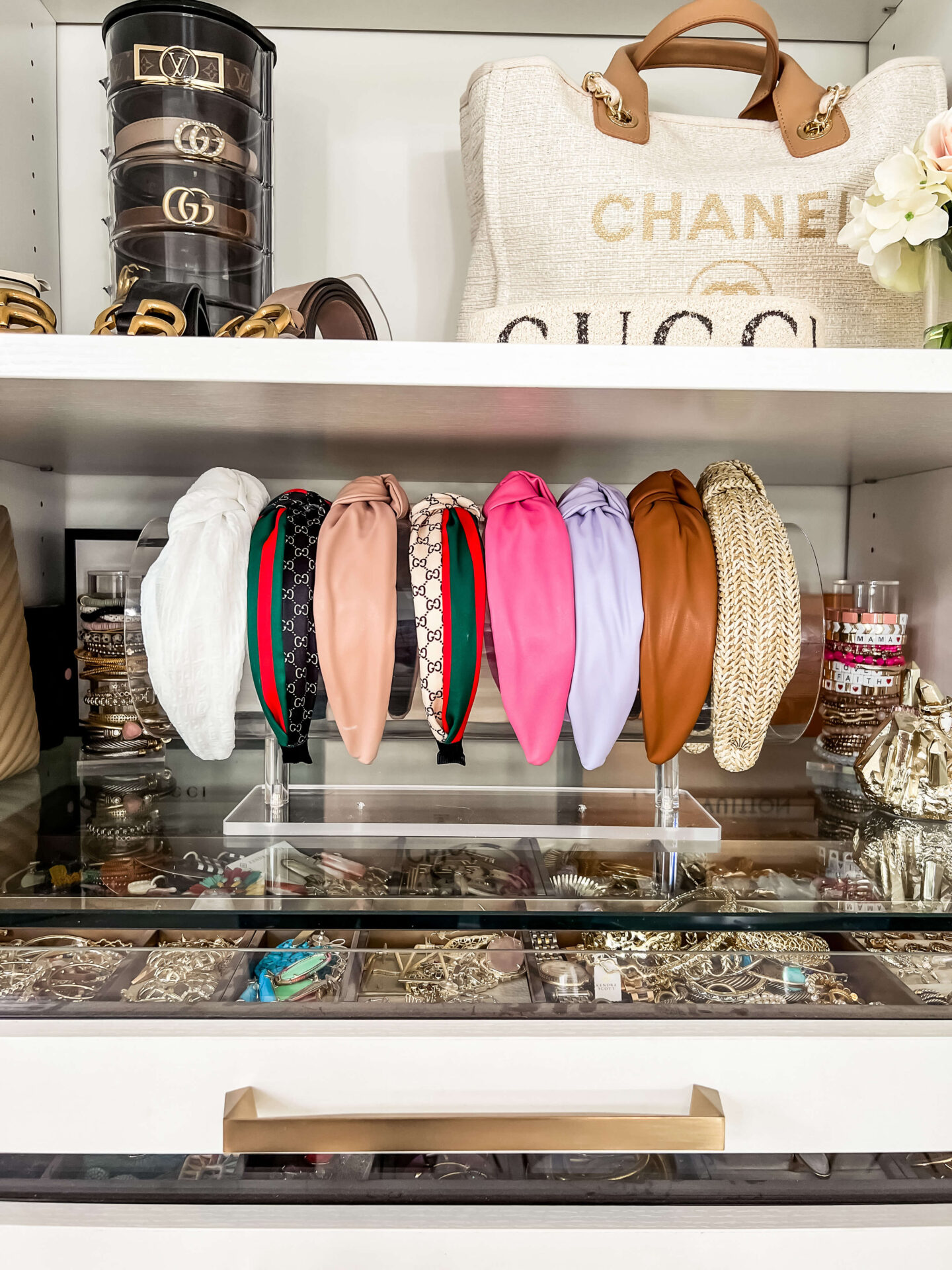 headbands on headband holder sitting on shelf in closet room