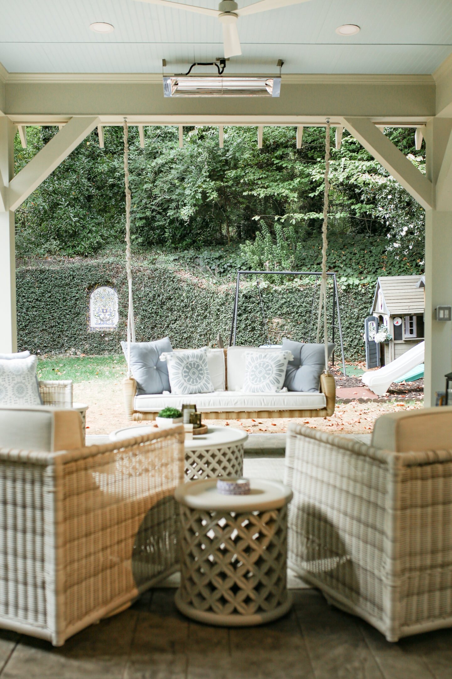 serena and lily outdoor daybed with white cushions and white and blue pillows