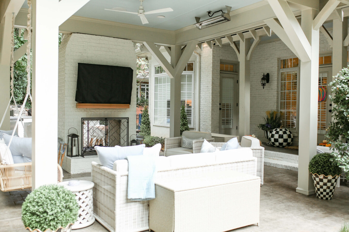 TV on back patio with couch