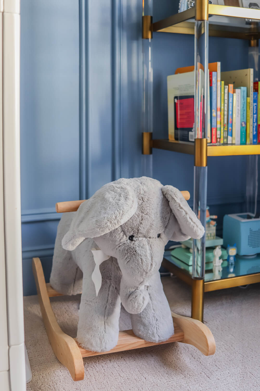 plush elephant rocker toy in nursery
