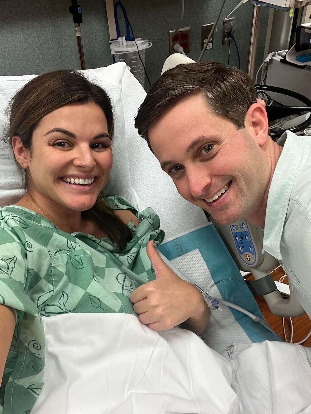man and woman with brown hair in hospital about to have a new baby