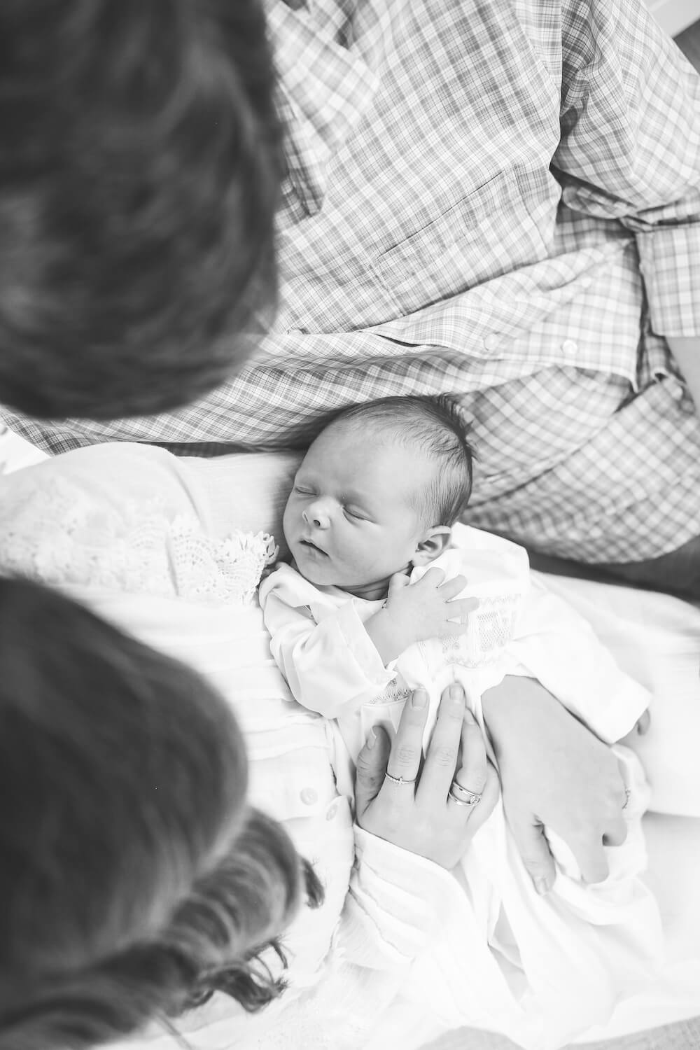 black and white photo from above of baby boy