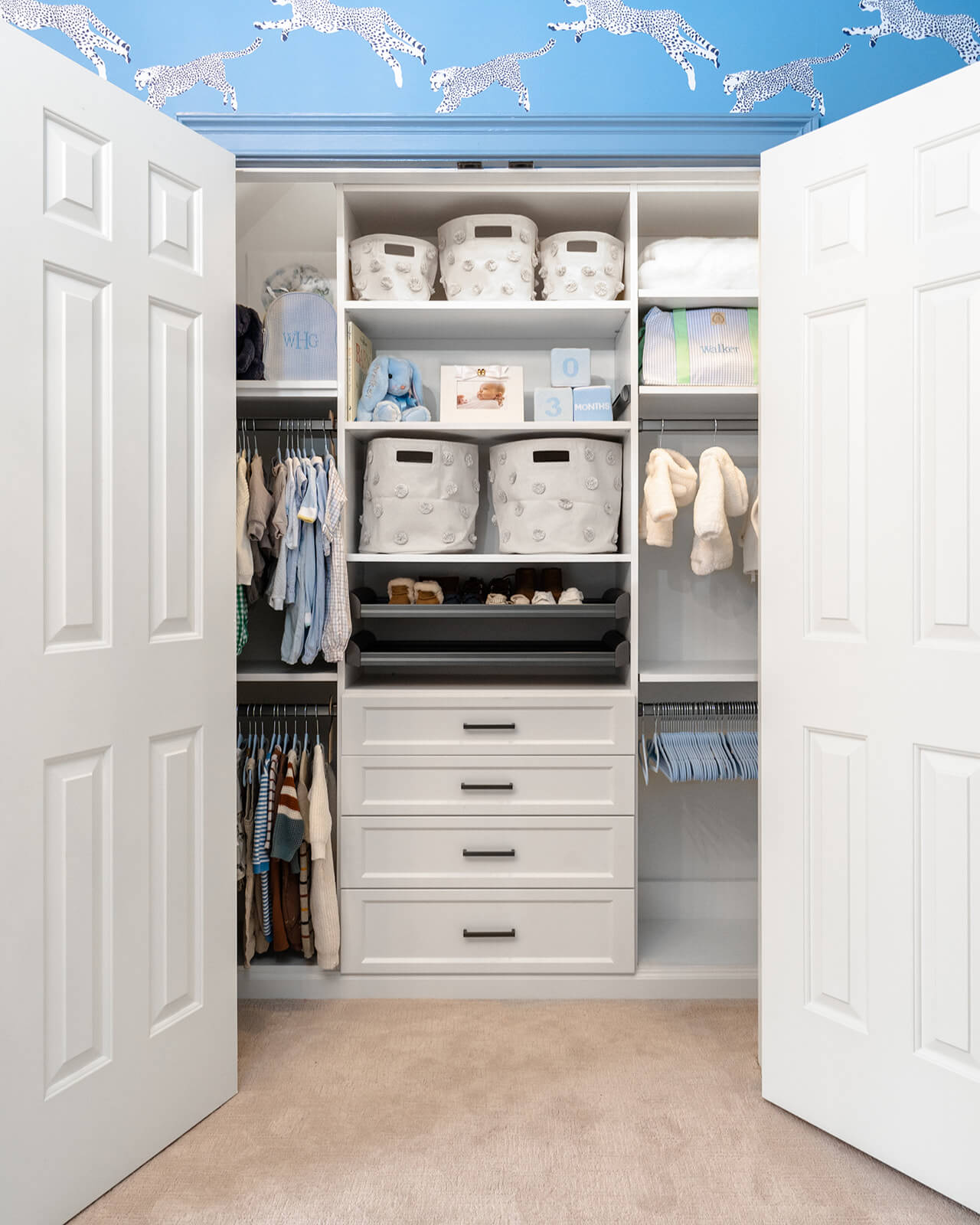 organized baby nursery closet