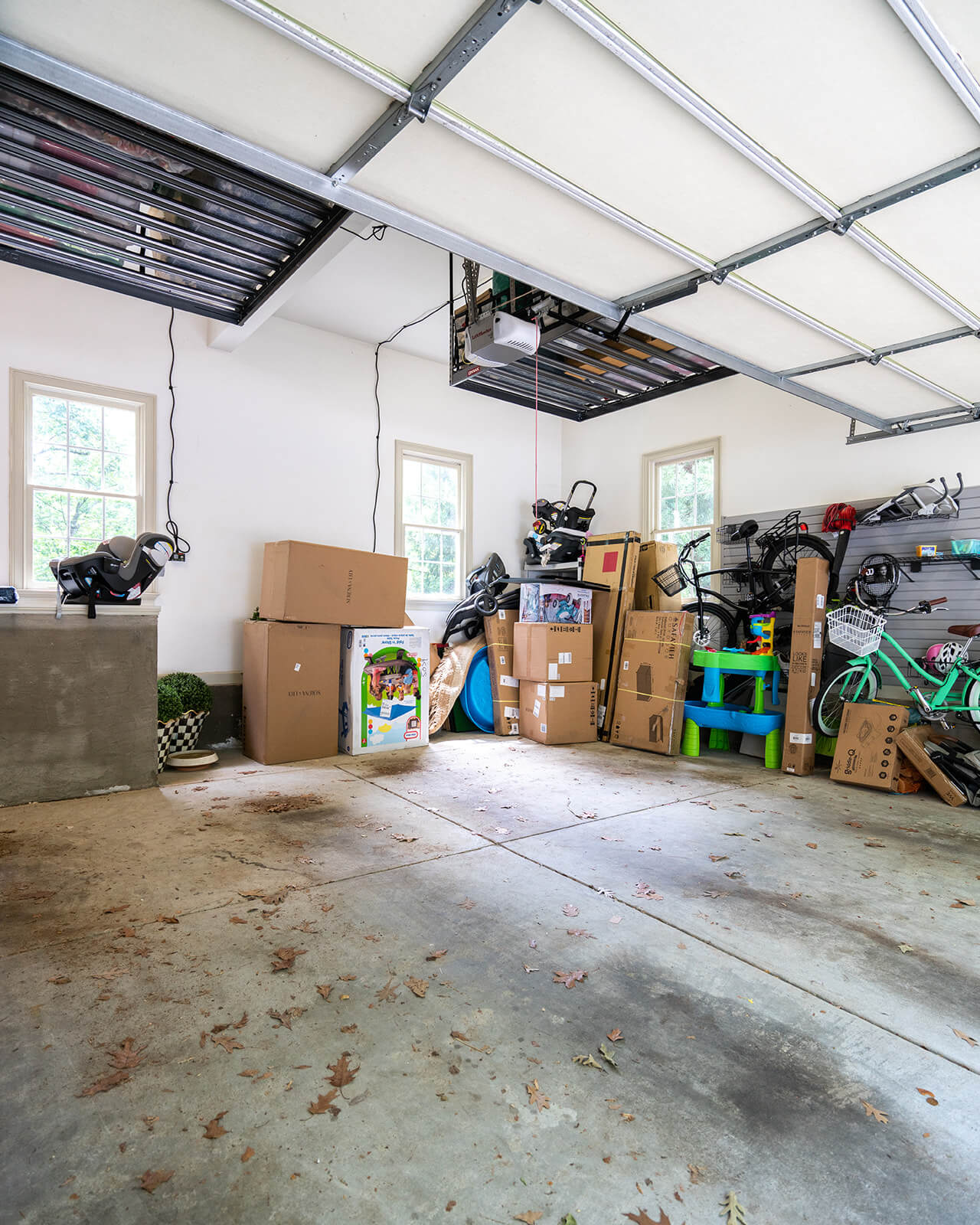 home garage makeover before with boxes stacked on sides