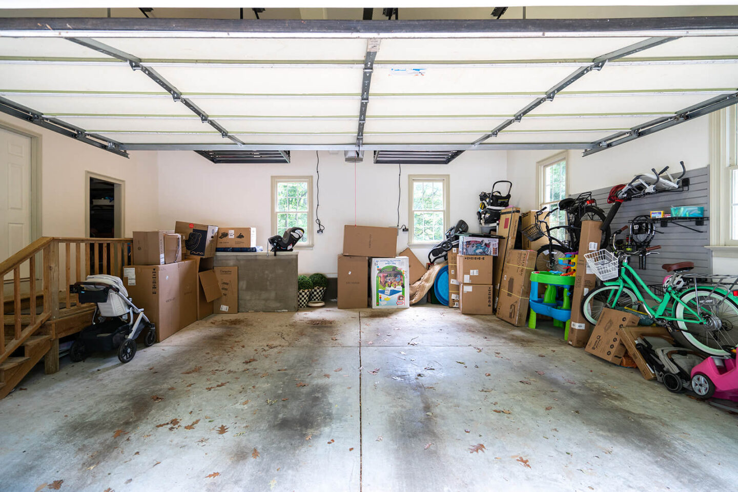 home garage makeover before with boxes stacked on sides
