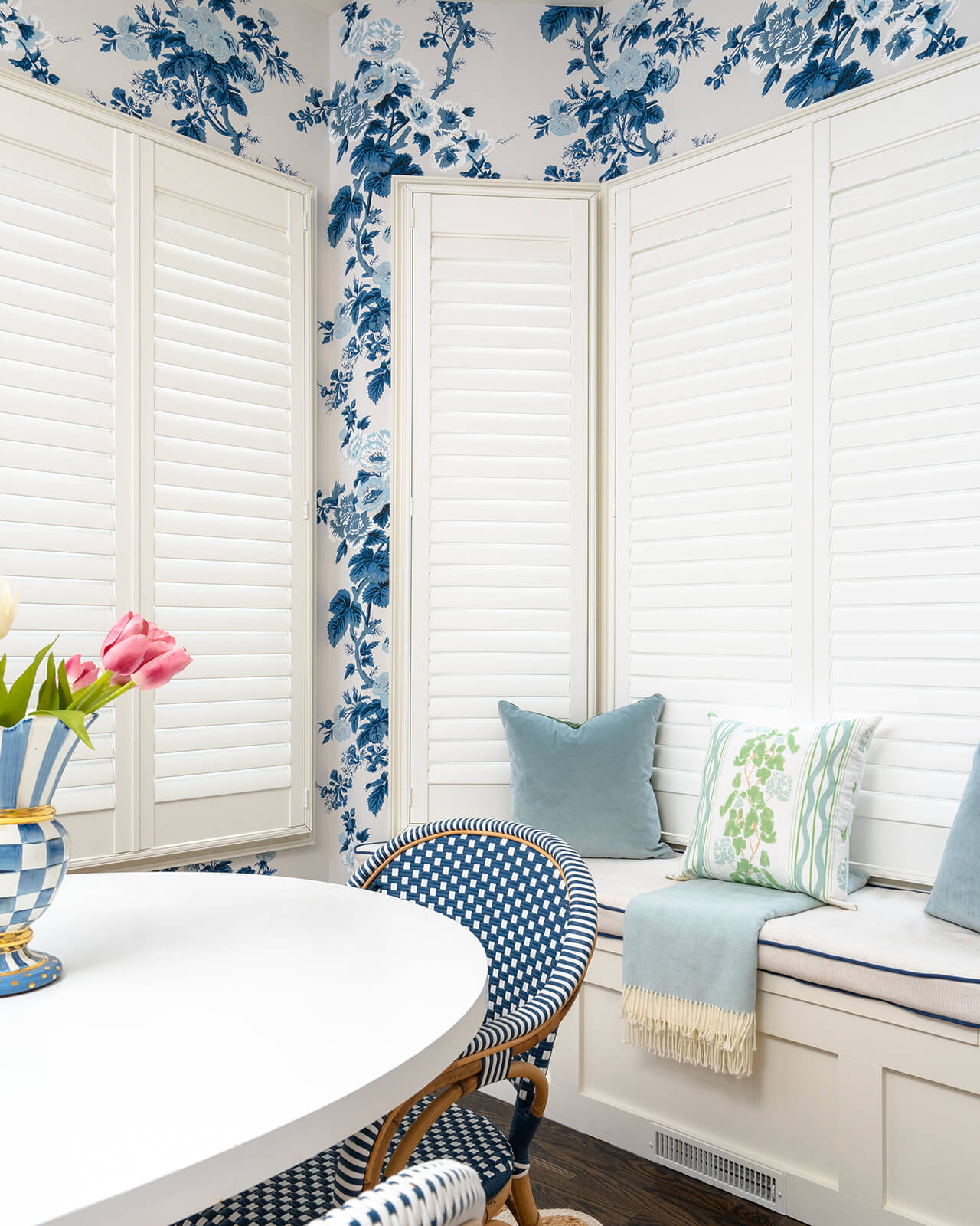 modern kitchen blinds closed in kitchen with white and blue floral wallpaper