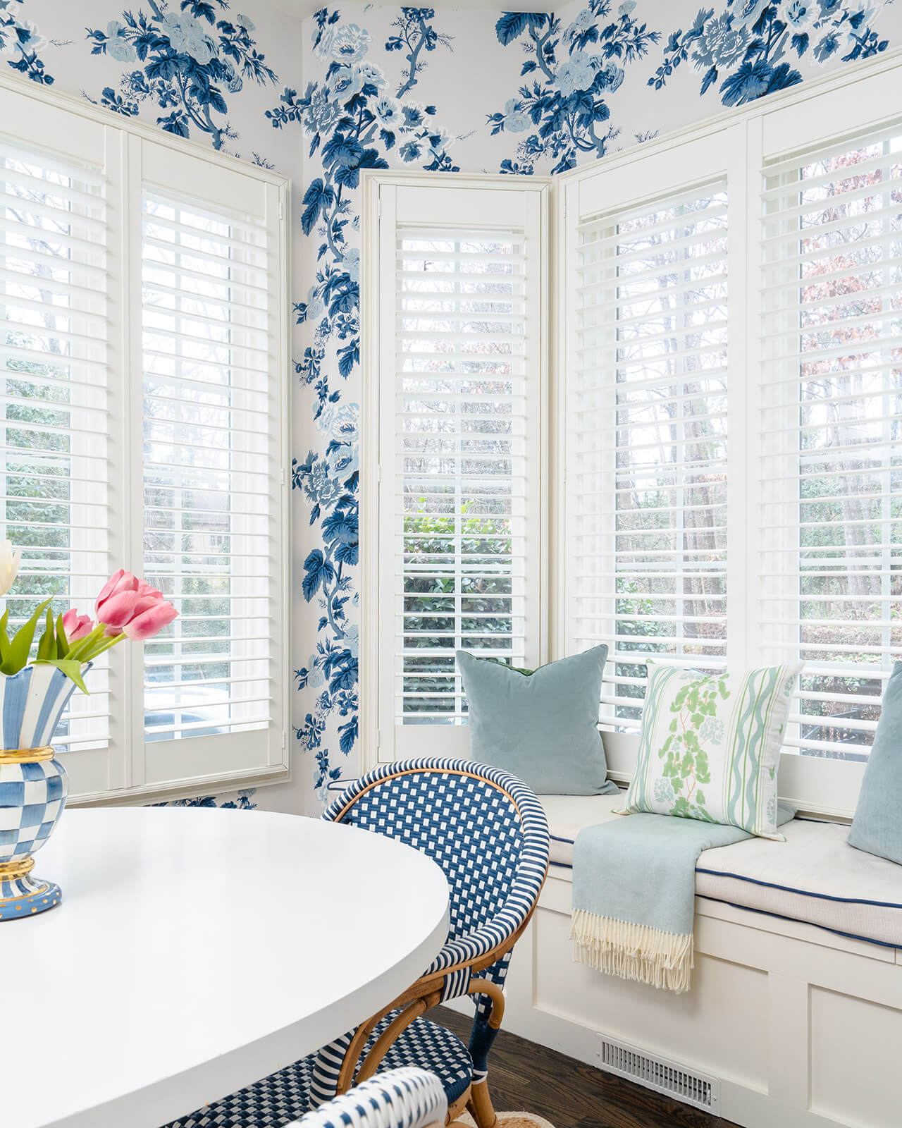 modern kitchen blinds open in kitchen with white and blue floral wallpaper